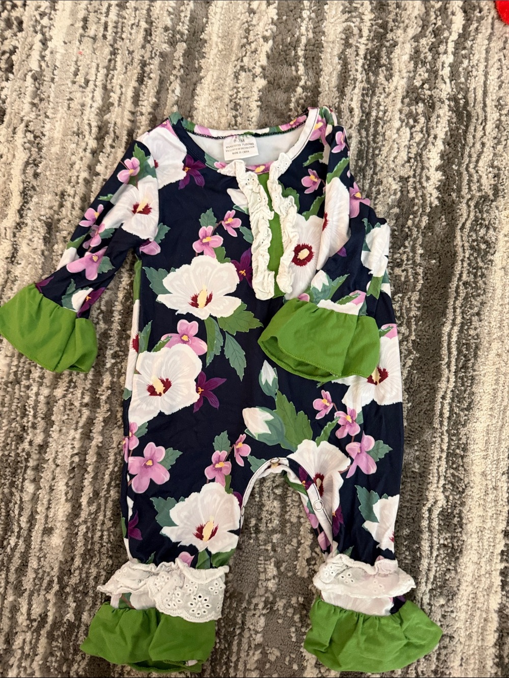 Navy Floral Ruffle One-Piece with Green Accents